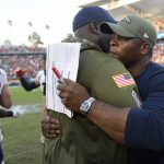 Head coach Vance Joseph of the Denver Broncos shares an embrace with head coach Anthony Lynn of the Los Angeles Chargers after winning 23-22 with 3 seconds left in the game at the StubHub Center November 18, 2018 in Carson, California. (Photo by Joe Amon/The Denver Post via Getty Images)