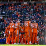 The Denver Broncos offense huddles around quarterback Case Keenum #4 in the second quarter of a game against the Pittsburgh Steelers at Broncos Stadium at Mile High on November 25, 2018 in Denver, Colorado. (Photo by Dustin Bradford/Getty Images)