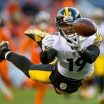 Wide receiver JuJu Smith-Schuster #19 of the Pittsburgh Steelers dives for the ball but is unable to complete a reception against the Denver Broncos in the third quarter of a game at Broncos Stadium at Mile High on November 25, 2018 in Denver, Colorado. (Photo by Matthew Stockman/Getty Images)