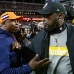Head coach Vance Joseph of the Denver Broncos and head coach Mike Tomlin of the Pittsburgh Steelers have a word on the field after a 24-17 Broncos win at Broncos Stadium at Mile High on November 25, 2018 in Denver, Colorado. (Photo by Matthew Stockman/Getty Images)