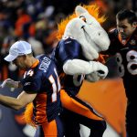 (HC)Denver Broncos WR Brandon Stokley, left, mascot Miles, center, and TE Tony Scheffler celebrate the winning of the game against New York Giants at Invesco Field at Mile High on Thursday. Denver won 26-6. Hyoung Chang/ The Denver Post  (Photo By Hyoung Chang/The Denver Post via Getty Images)