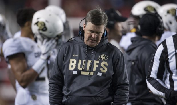 Head coach Mike MacIntyre of the Colorado Buffaloes reacts as he walks on the sidelines during thei...