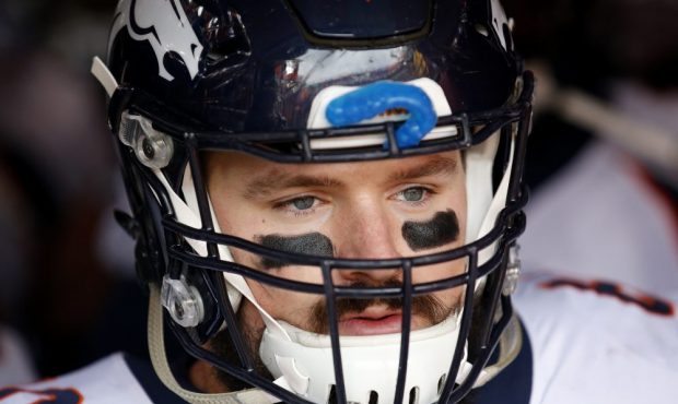 Offensive guard Connor McGovern #60 of the Denver Broncos waits to take the field against the Washi...