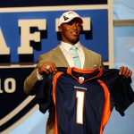 NEW YORK - APRIL 22:  Demaryius Thomas from the Georgia Tech Yellow Jackets holds up a Denver Broncos jersey after he was drafted by the Broncos number 22 overall during the the first round of the 2010 NFL Draft at Radio City Music Hall on April 22, 2010 in New York City.  (Photo by Jeff Zelevansky/Getty Images)