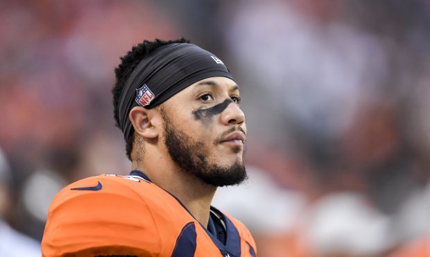 Shane Ray (56) of the Denver Broncos stands on the sidelines against the Chicago Bears during the f...