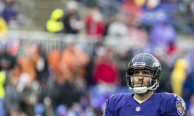 Joe Flacco #5 of the Baltimore Ravens looks on against the Denver Broncos during the second half at...