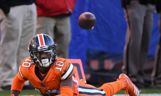 Emmanuel Sanders (10) of the Denver Broncos unable to pull in a catch during the second quarter aga...