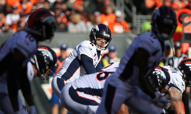 Denver Broncos quarterback Case Keenum (4) gets ready for a play during the game against the Denver...