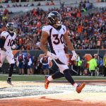 Denver Broncos running back Phillip Lindsay (30) carries the ball for a touchdown during the game against the Denver Broncos and the Cincinnati Bengals on December 2nd 2018, at Paul Brown Stadium in Cincinnati, OH. (Photo by Ian Johnson/Icon Sportswire via Getty Images)