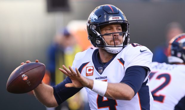 Denver Broncos quarterback Case Keenum (4) looks to pass during the game against the Denver Broncos...