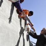 John Elway, President of football operations/general manager of the Denver Broncos, signs autographs for the fans before the Broncos took the field to play the Cincinnati Bengals at Paul Brown Stadium December 02, 2018. (Photo by Andy Cross/The Denver Post via Getty Images)