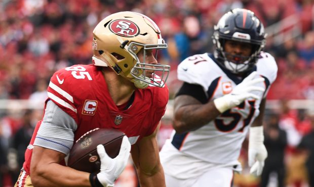 San Francisco 49ers Tight End George Kittle (85) turns upfield after a reception with Denver Bronco...