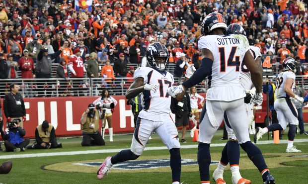 DaeSean Hamilton #17 and Courtland Sutton #14 of the Denver Broncos celebrate his TD in the second ...