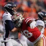 Case Keenum #4 of the Denver Broncos is hit by Fred Warner #48 of the San Francisco 49ers during their NFL game at Levi's Stadium on December 9, 2018 in Santa Clara, California. (Photo by Robert Reiners/Getty Images)