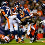 Quarterback Case Keenum #4 of the Denver Broncos is hit by outside linebacker Jamie Collins #51 of the Cleveland Browns on a first quarter pass attempt at Broncos Stadium at Mile High on December 15, 2018 in Denver, Colorado. (Photo by Justin Edmonds/Getty Images)