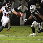 Phillip Lindsay #30 of the Denver Broncos catches a lateral against the Oakland Raiders during their NFL game at Oakland-Alameda County Coliseum on December 24, 2018 in Oakland, California. (Photo by Robert Reiners/Getty Images)