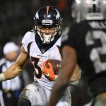 Phillip Lindsay #30 of the Denver Broncos rushes with the ball against the Oakland Raiders during their NFL game at Oakland-Alameda County Coliseum on December 24, 2018 in Oakland, California. (Photo by Robert Reiners/Getty Images)