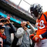 Outside linebacker Von Miller #58 of the Denver Broncos signs autographs for fans before a game against the Los Angeles Chargers at Broncos Stadium at Mile High on December 30, 2018 in Denver, Colorado. (Photo by Justin Edmonds/Getty Images)