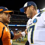 Quarterback Philip Rivers #17 of the Los Angeles Chargers and quarterback Case Keenum #4 of the Denver Broncos shake hands on the field after the Chargers' 23-9 win over the Denver Broncos at Broncos Stadium at Mile High on December 30, 2018 in Denver, Colorado. (Photo by Dustin Bradford/Getty Images)