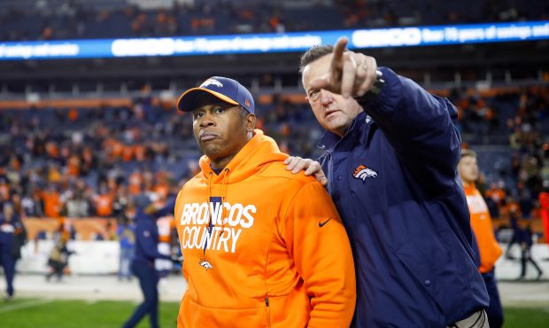 Head coach Vance Joseph of the Denver Broncos walks onto the field after a 23-9 loss against the Lo...