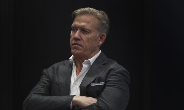 President of Football Operations and General Manager John Elway, of the Denver Broncos, speaks to m...