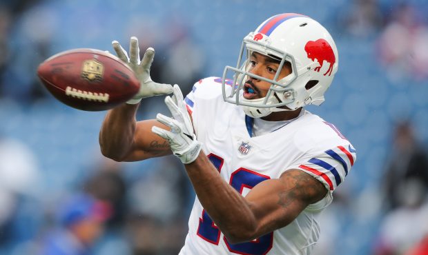 Andre Holmes #18 of the Buffalo Bills attempts to catch a ball before an NFL game against the Oakla...