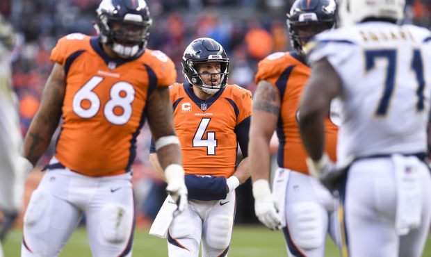 Case Keenum (4) of the Denver Broncos cannot score inside the redzone against the Los Angeles Charg...