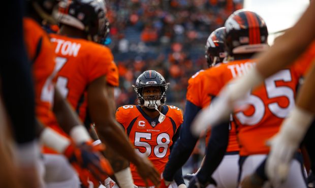 Outside linebacker Von Miller #58 of the Denver Broncos runs onto the field before a game against t...