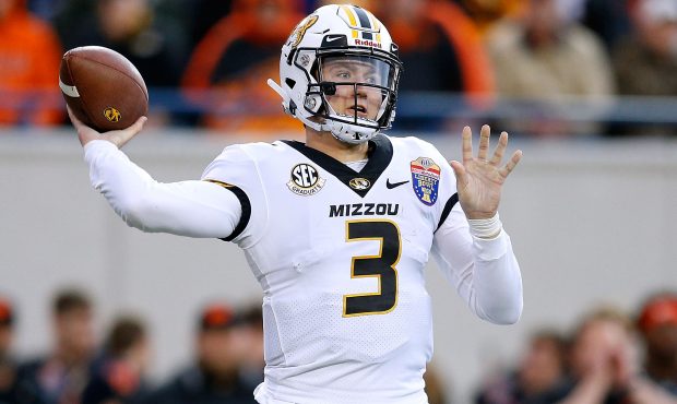 Drew Lock #3 of the Missouri Tigers throws the ball against the Oklahoma State Cowboys during the f...
