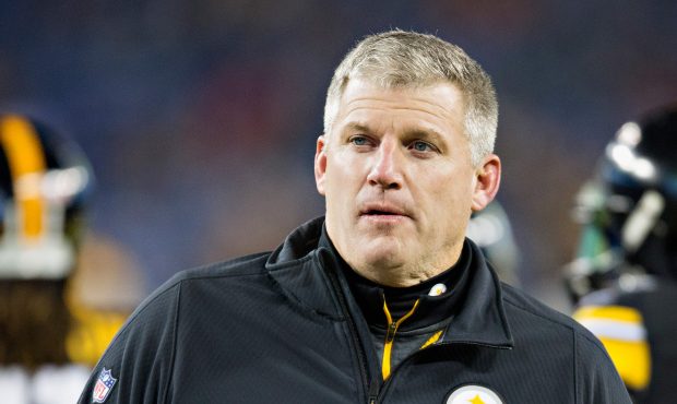 Mike Munchak, offensive line coach for the Pittsburgh Steelers, looks on during the fourth quarter ...