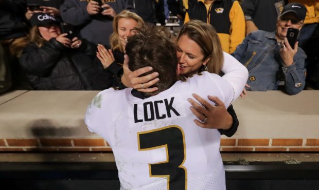 KNOXVILLE, TN - NOVEMBER 17: Drew Lock #3 of the Missouri Tigers hugs his mother in the stands duri...