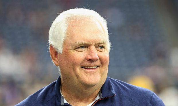 Defensive coordinator Wade Phillips of the Denver Broncos waits on the field before their game agai...
