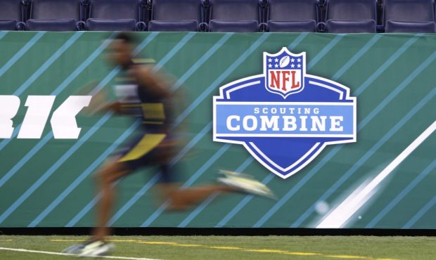 General view as a player runs the 40-yard dash during day six of the NFL Combine at Lucas Oil Stadi...