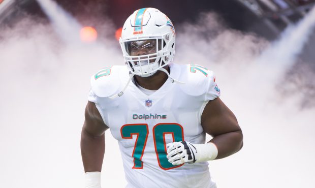 Miami Dolphins Offensive Tackle Ja'Wuan James (70) runs onto the field before the start of the NFL ...
