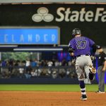 MIAMI, FL - MARCH 28: Trevor Story #27 of the Colorado Rockies rounds the bases after hitting a solo home run in the fifth inning against the Miami Marlins during Opening Day at Marlins Park on March 28, 2019 in Miami, Florida. (Photo by Mark Brown/Getty Images)