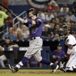 MIAMI, FL - MARCH 28: Trevor Story #27 of the Colorado Rockies hits a home run in the fifth inning during a game between the Colorado Rockies and the Miami Marlins at Marlins Park on Thursday, March 28, 2019 in Miami, Florida. (Photo by Rhona Wise/MLB Photos via Getty Images)