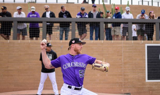 Jon Gray #55 of the Colorado Rockies warms up in the bullpen prior to the spring training game agai...