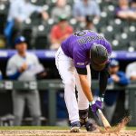 Nolan Arenado #28 of the Colorado Rockies hits the ground with his bat after hitting a pop up ion the ninth inning of a game against the Los Angeles Dodgers during the Colorado Rockies home opener at Coors Field on April 5, 2019 in Denver, Colorado. (Photo by Dustin Bradford/Getty Images)