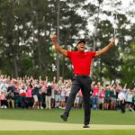 Tiger Woods of the United States celebrates after sinking his putt on the 18th green to win during the final round of the Masters at Augusta National Golf Club on April 14, 2019 in Augusta, Georgia. (Photo by Kevin C. Cox/Getty Images)