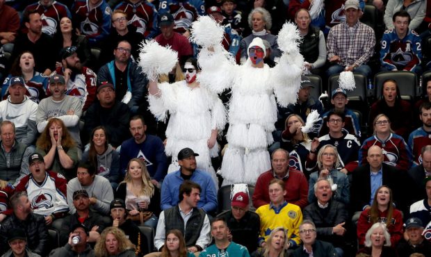 DENVER, COLORADO - MAY 02: Fans watch the Colorado Avalanche play the San Jose Sharks during Game F...