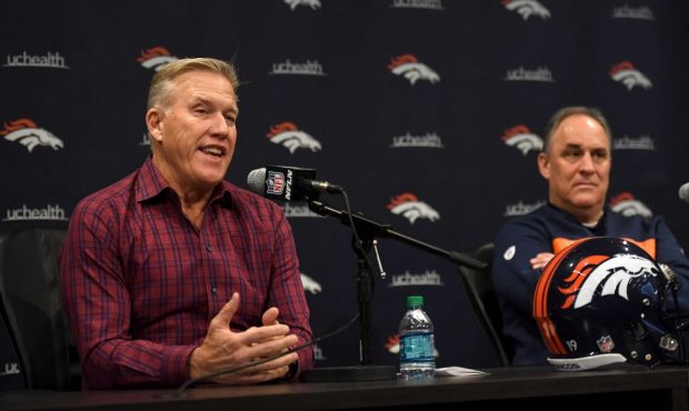 Denver Broncos president of football operations/general manager John Elway and head coach Vic Fangi...