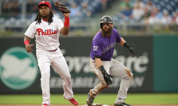 Maikel Franco #7 of the Philadelphia Phillies tags out Charlie Blackmon #19 of the Colorado Rockies...