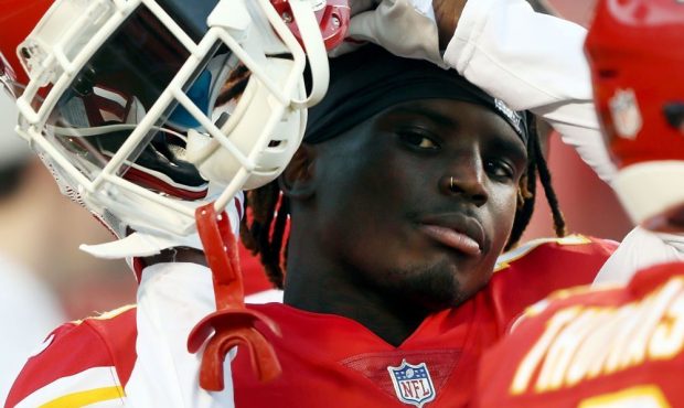 Wide receiver Tyreek Hill #10 of the Kansas City Chiefs takes his helmet off during warm-ups prior ...
