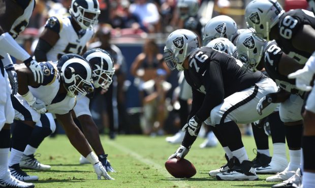Oakland Raiders (76) Jon Feliciano (G) prepares to snap the ball from the line of scrimmage during ...
