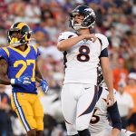 Brandon McManus #8 of the Denver Broncos watches his field goal, to tie the game 3-3, in front of Donte' Deayon #27 of the Los Angeles Rams during the second quarter of a preseason game at Los Angeles Memorial Coliseum on August 24, 2019 in Los Angeles, California. (Photo by Harry How/Getty Images)