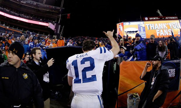 Andrew Luck #12 of the Indianapolis Colts leaves the field after defeating the Denver Broncos 24-13...