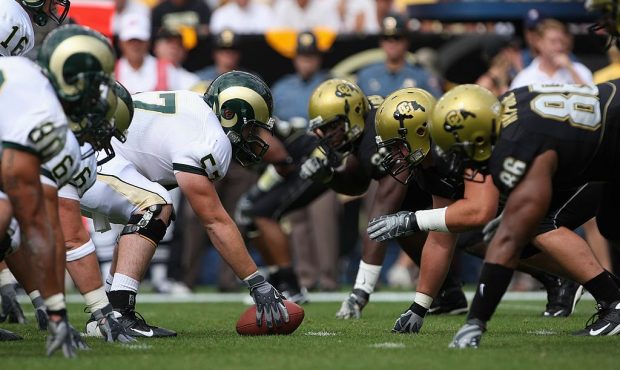 Center Tim Walter #57 of the Colorado State Rams readies to snap the ball at the line of scrimmage ...