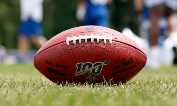 An NFL 100 football on the field during the Colts training camp at Grand Park on August 5, 2019 in ...