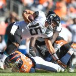 DENVER, CO - SEPTEMBER 29:  Gardner Minshew #15 of the Jacksonville Jaguars is sacked by Bradley Chubb #55 of the Denver Broncos in the second quarter of a game at Empower Field at Mile High on September 29, 2019 in Denver, Colorado. (Photo by Dustin Bradford/Getty Images)