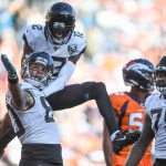 DENVER, CO - SEPTEMBER 29:  James O'Shaughnessy #80 of the Jacksonville Jaguars celebrates along with Dede Westbrook #12 after scoring a third quarter touchdown against the Denver Broncos at Empower Field at Mile High on September 29, 2019 in Denver, Colorado. (Photo by Dustin Bradford/Getty Images)
